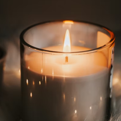 Candle Jar with soot on the side of the glass